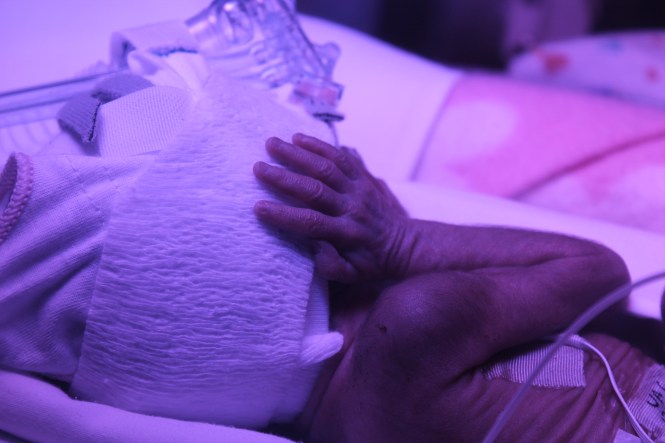 Michaela's got long fingers like her mom...