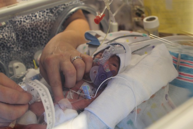 Max opening his eyes while crying during his cares (diaper change, temperature check, belly measurements...)