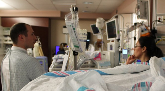 Michael and one of our nurses discussing Michaela's heart rate.