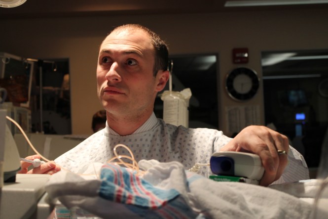 Dad performs his first temperature check...