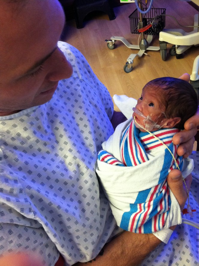 Max trying to see what his dad looks like